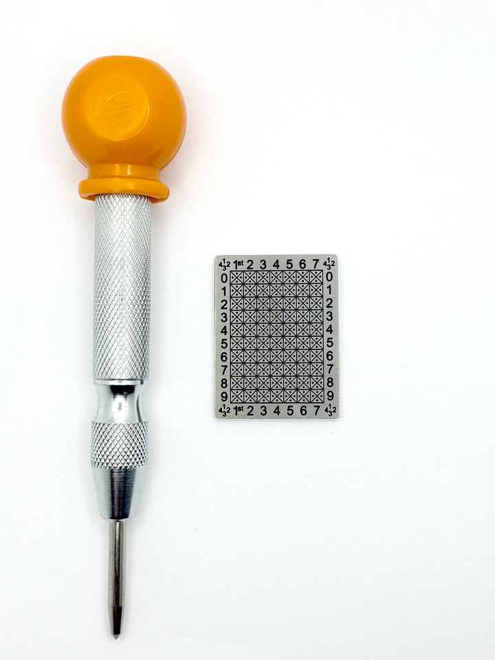 Automatic center punch beside a 12-word Compact Punchplate.